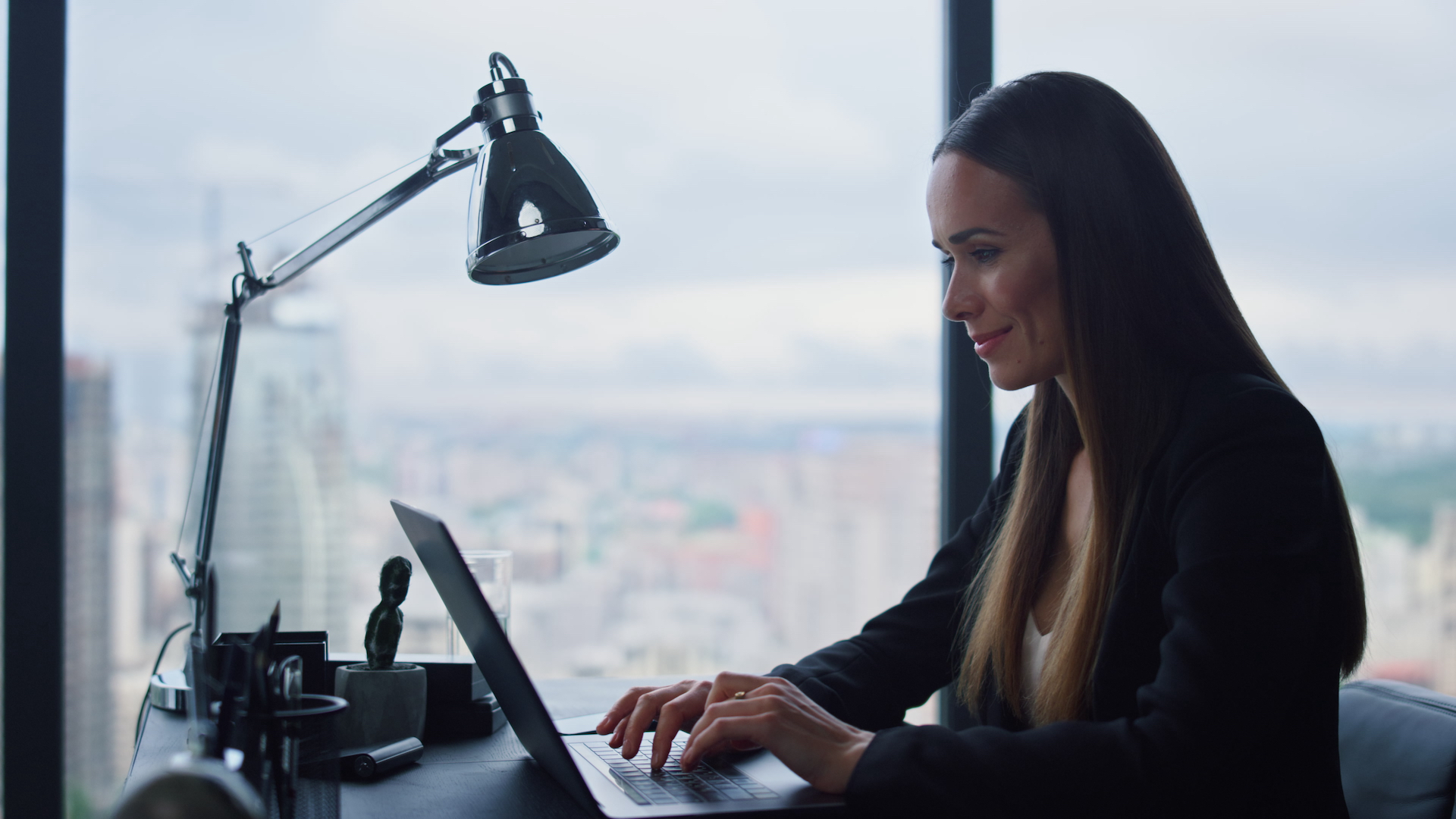 woman staring at laptop