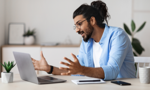 Man looking at laptop.