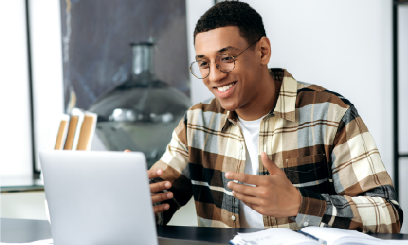 Man talking to laptop