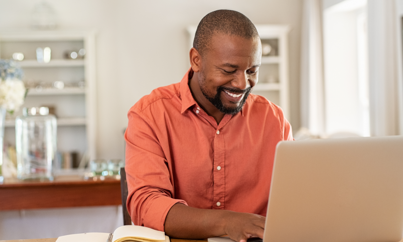 Man looking at laptop.