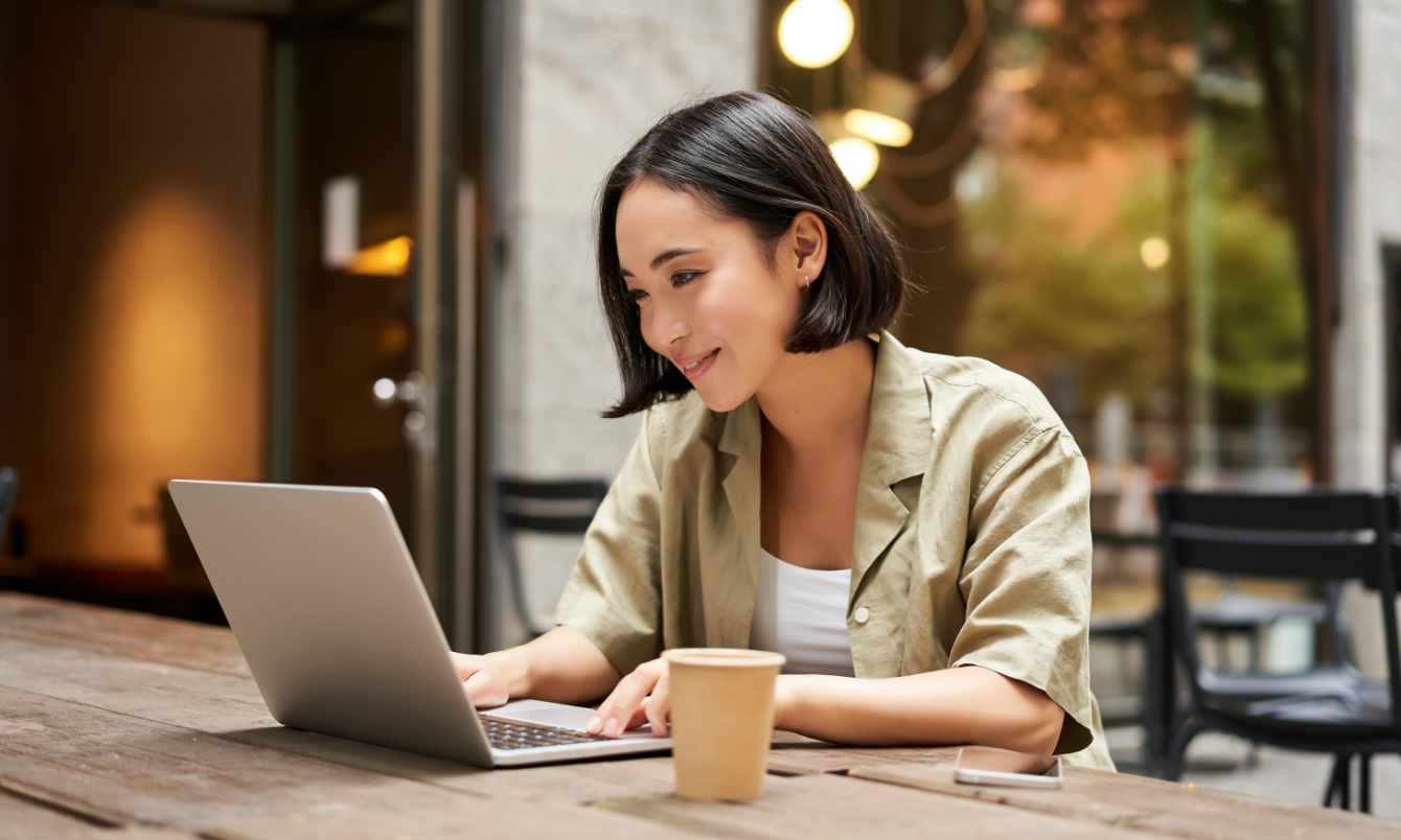 Worker looking at a laptop.