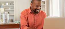 Man looking at laptop.