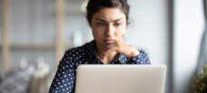 Woman looking at computer