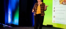 Woman speaker on stage