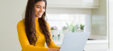 Female typing on laptop