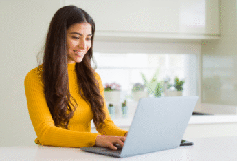 Female typing on laptop